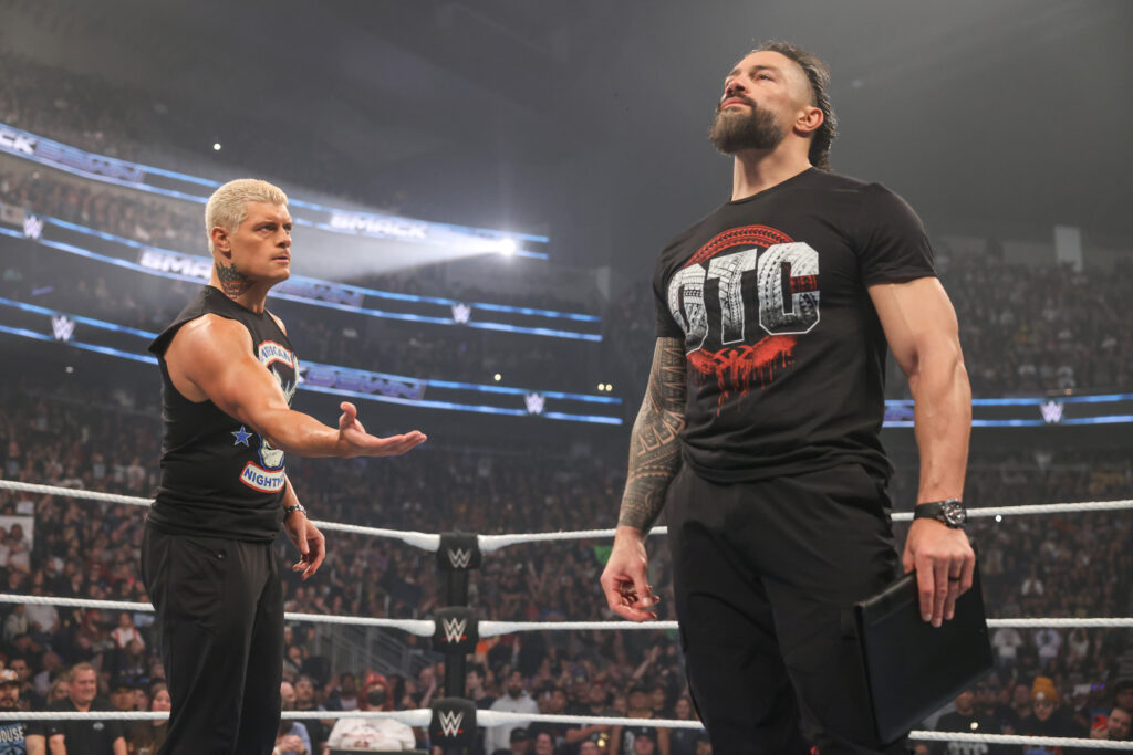 Cody Rhodes offering Roman Reigns a handshake on WWE SmackDown