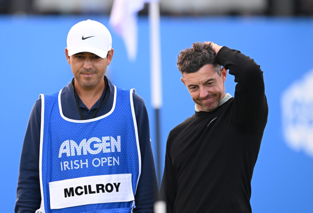 Rory McIlroy of Northern Ireland and his caddie Harry Diamond
