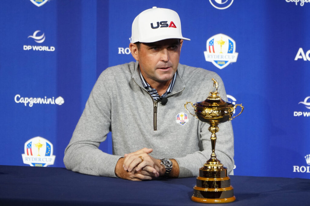 Keegan Bradley of The United States speaks at a press conference in front of the Ryder Cup trophy