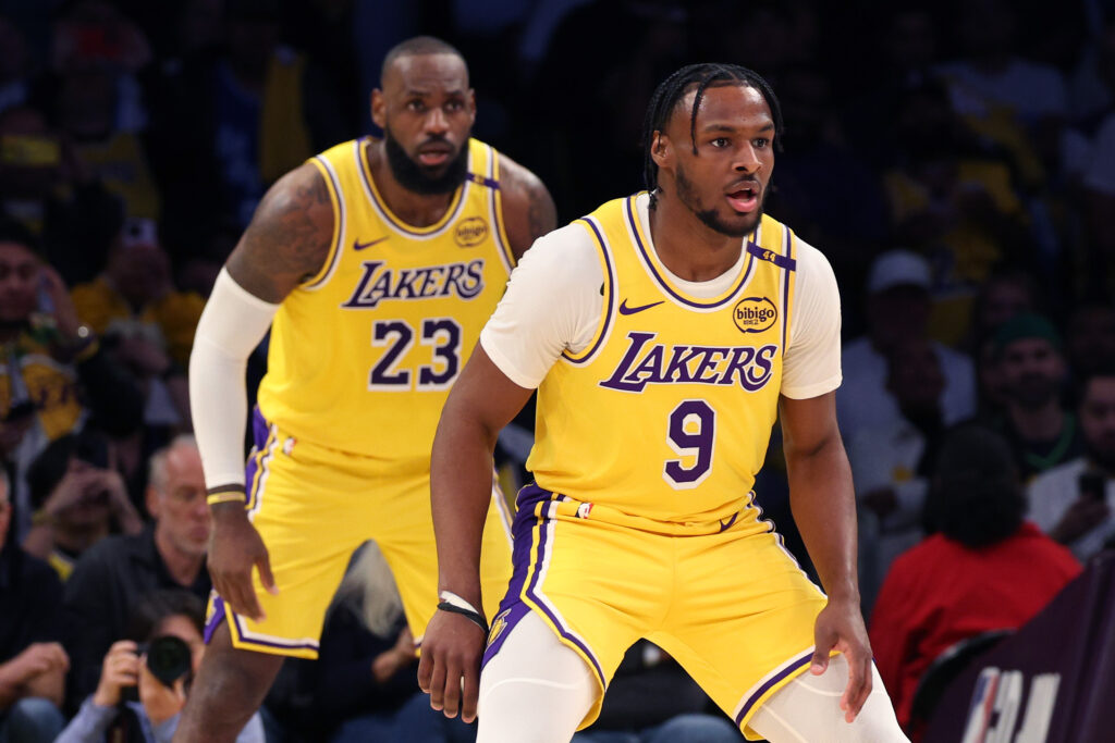 LeBron James (L) and Bronny James (R) during a game against the Minnesota Timberwolves.