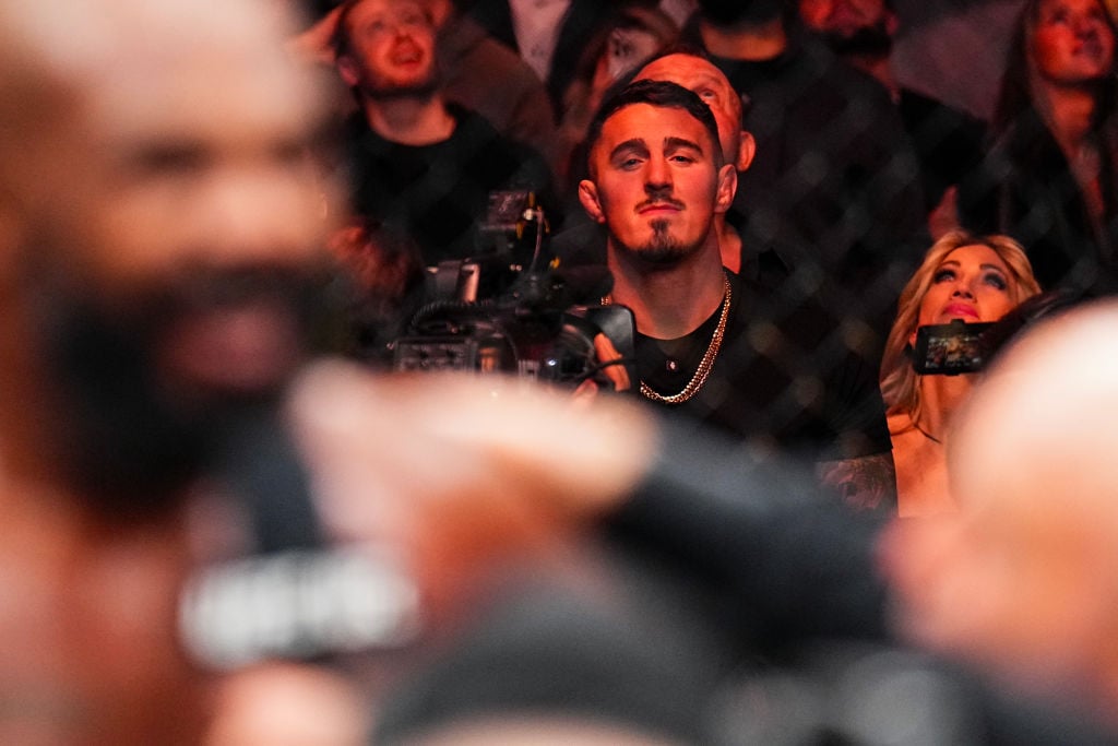 Tom Aspinall watches Jon Jones v Stipe Miocic at UFC 309.