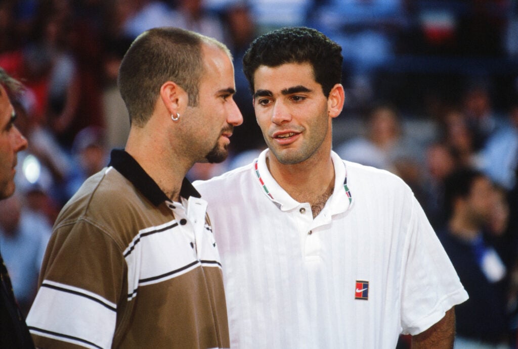 Pete Sampras talks to Andre Agassi after their 1995 US Open final.