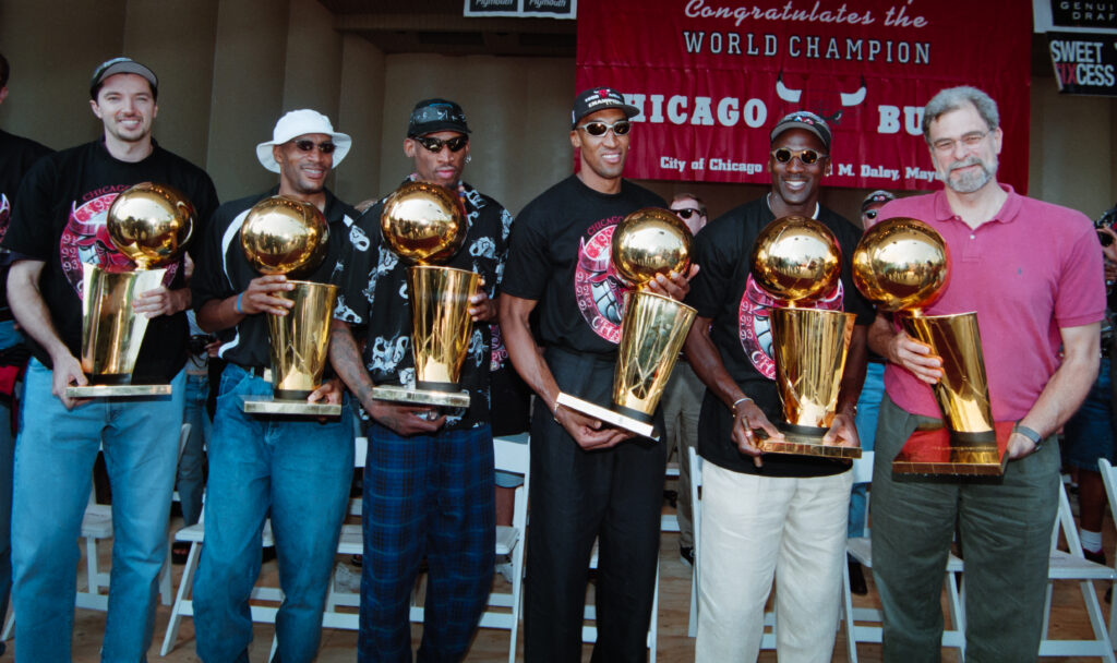 Michael Jordan, Scottie Pippen and the Chicago Bulls parading their Six Championship trophies in 1998.