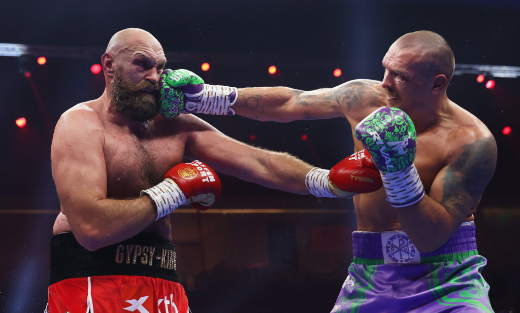 Tyson Fury and Oleksandr Usyk exchange in their anticipated rematch