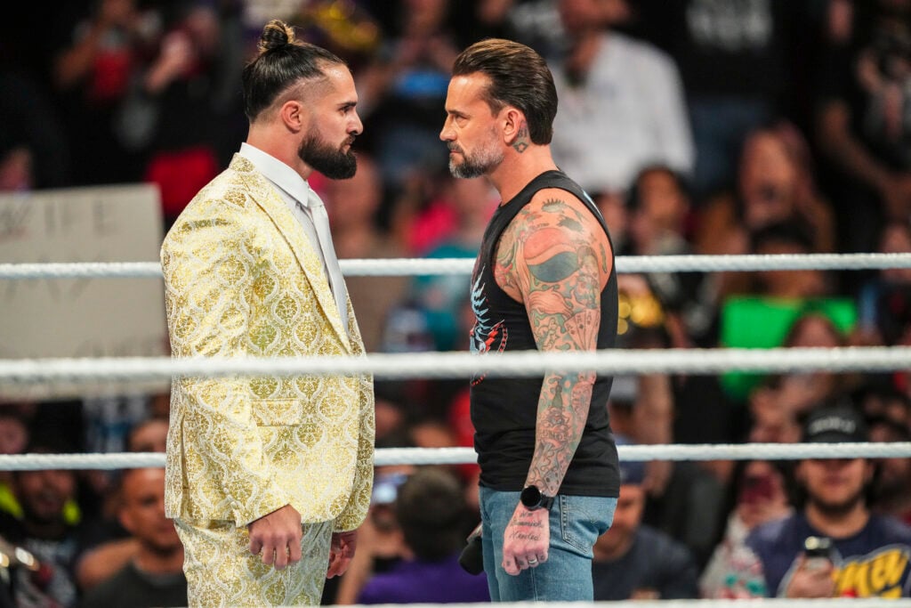 CM Punk and Seth Rollins conducting a stare-down on WWE Monday Night RAW