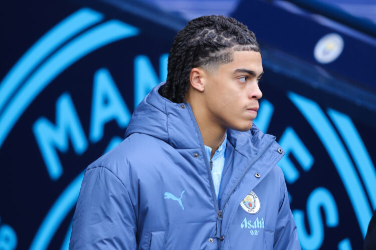 Jahmai Simpson-Pusey with the ball during Manchester City v Feyenoord