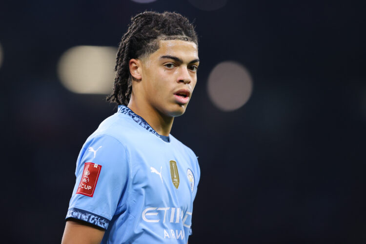 Jahmai Simpson-Pusey looks on during Manchester City v Salford City