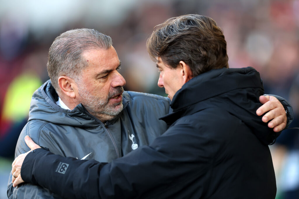 Ange Postecoglou and Thomas Frank embrace during a Premier League match between Tottenham Hotspur and Brentford.