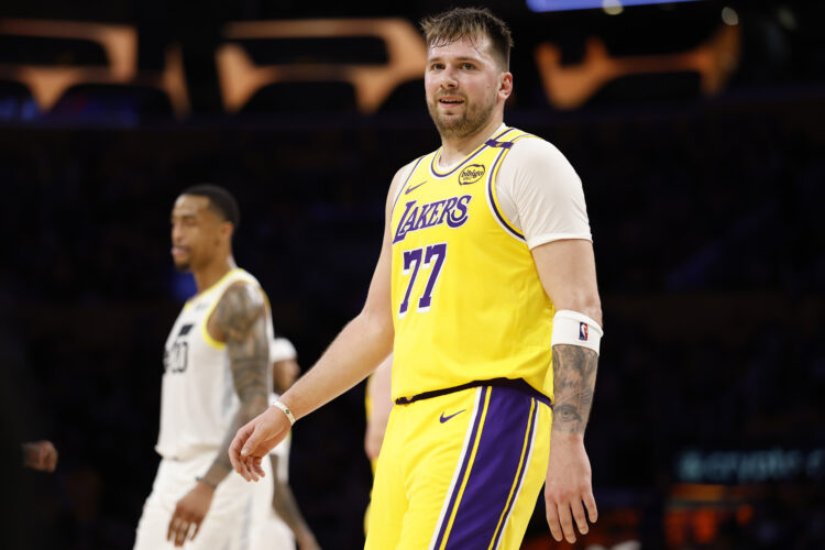 Luka Doncic #77 of the Los Angeles Lakers reacts after fouling.