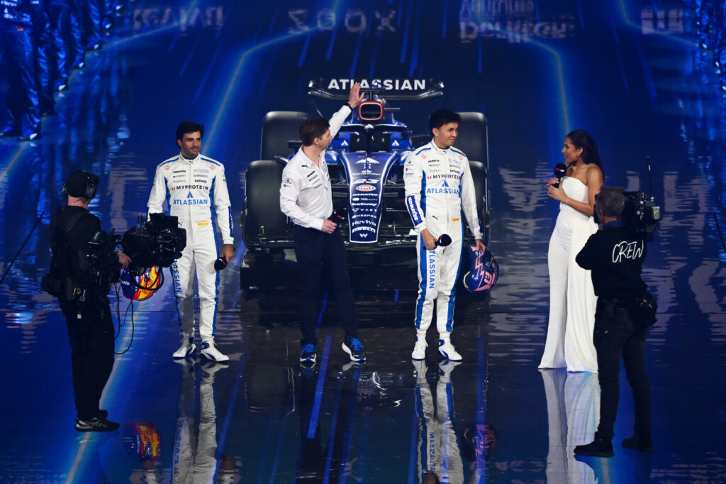 James Vowles, Alexander Albon and Carlos Sainz of Williams on stage at the F1 live show