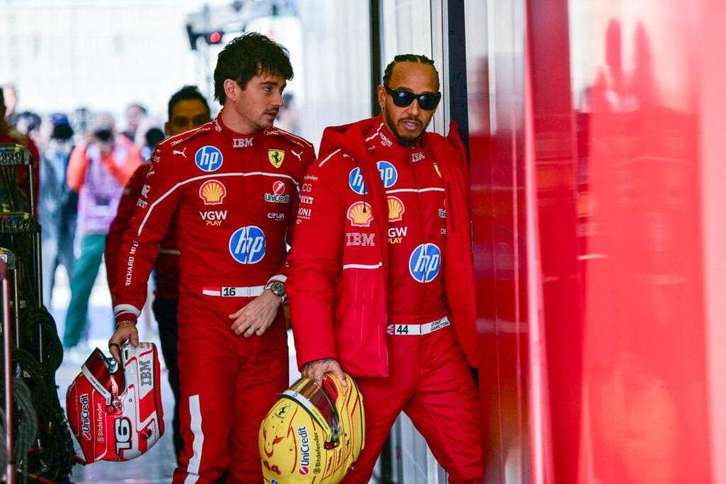 Lewis Hamilton and Charles Leclerc in the Ferrari garage