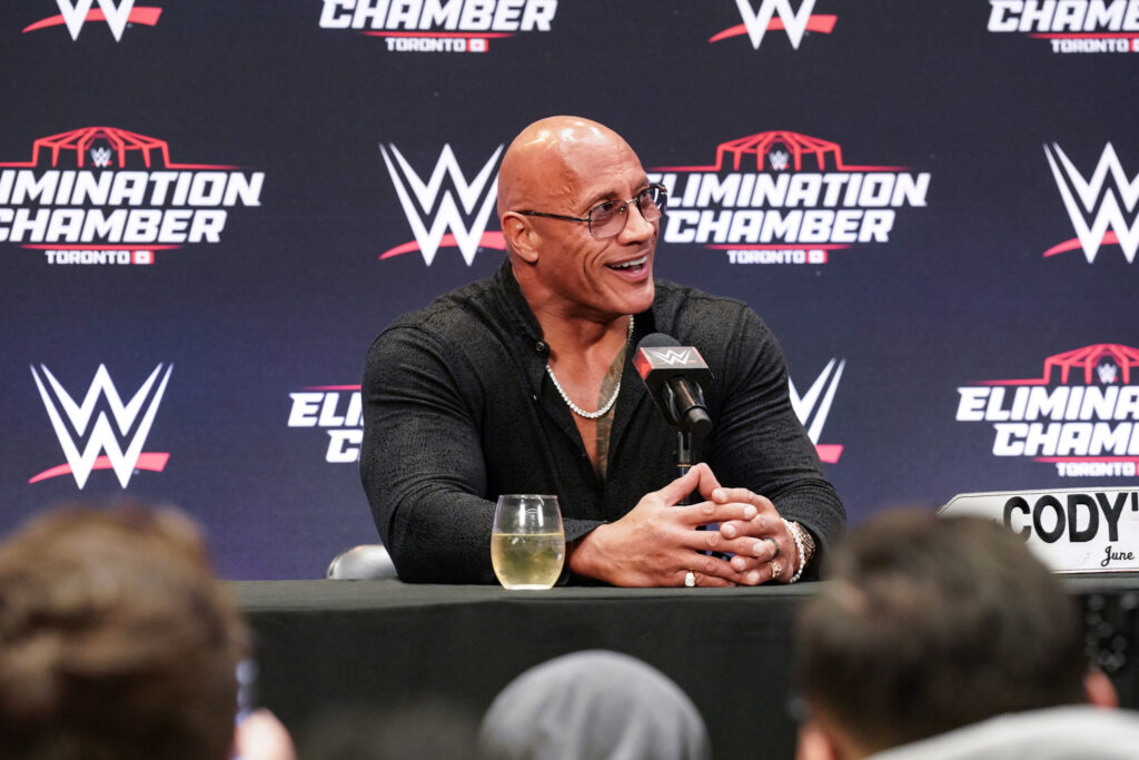 The Rock speaking to the press at WWE Elimination Chamber