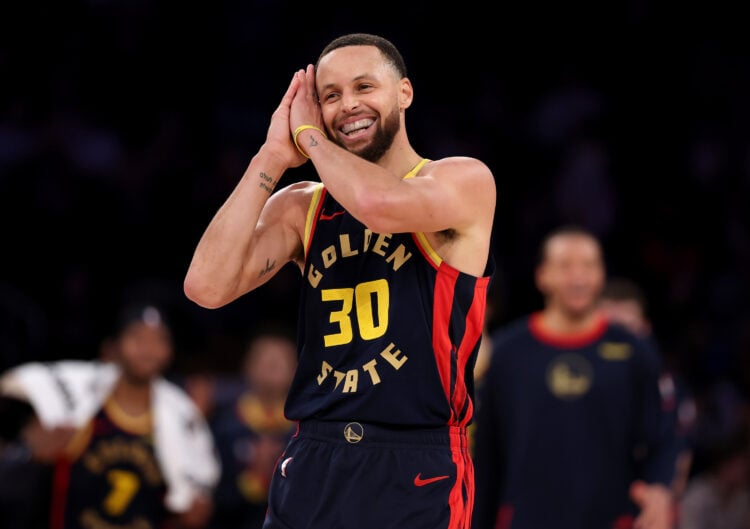 Stephen Curry #30 of the Golden State Warriors celebrates after a three point