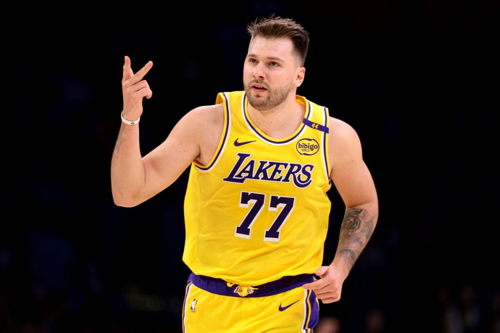 Luka Doncic #77 of the Los Angeles Lakers celebrates a three-point basket
