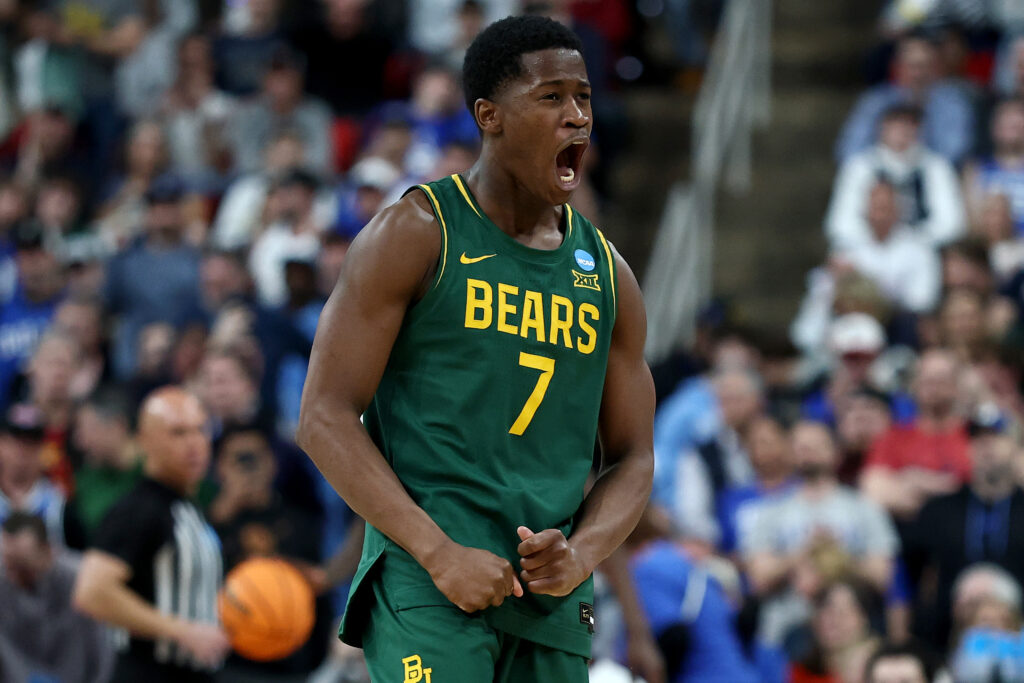 VJ Edgecombe #7 of the Baylor Bears celebrates in the first round of the NCAA Men's Basketball Tournament against the Mississippi State Bulldogs.