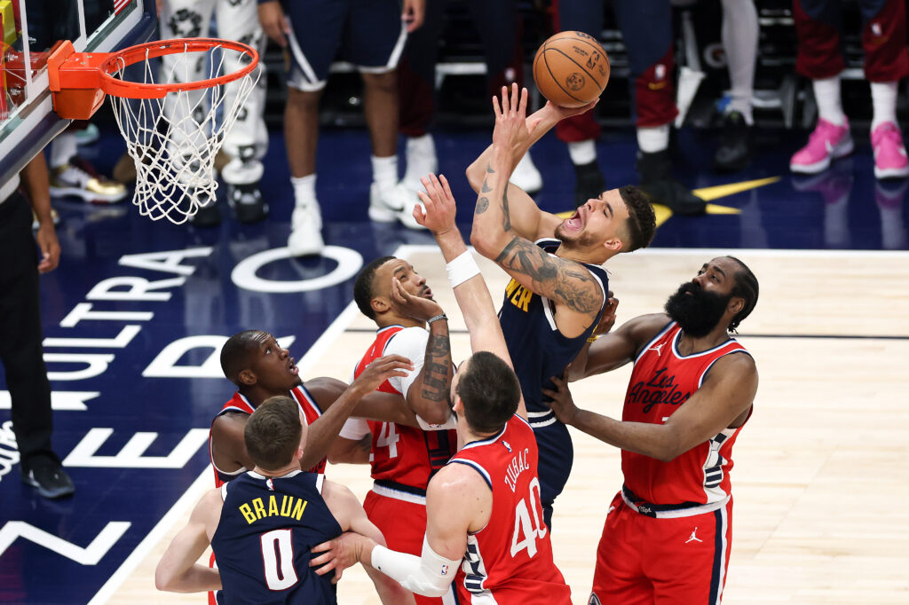 Michael Porter Jr. #1 of the Denver Nuggets takes a shot against Norman Powell #24, Ivica Zubac #40 and James Harden #1 of the Los Angeles Clippers
