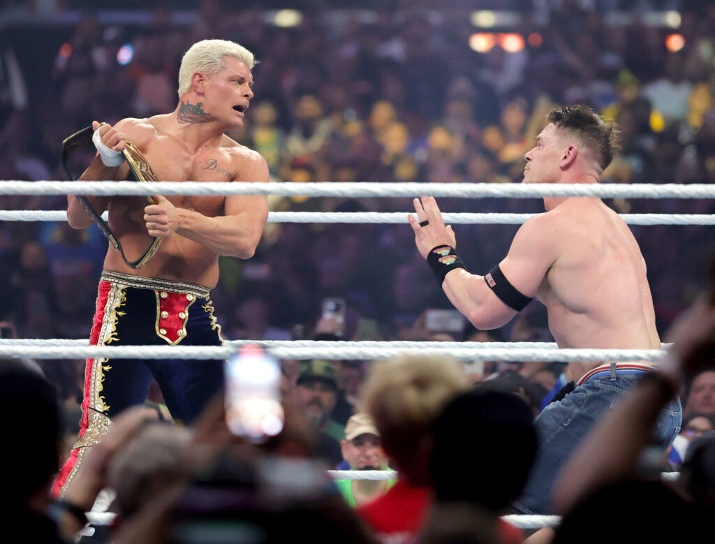 Cody Rhodes threatening to hit John Cena with the WWE Championship at WrestleMania 41