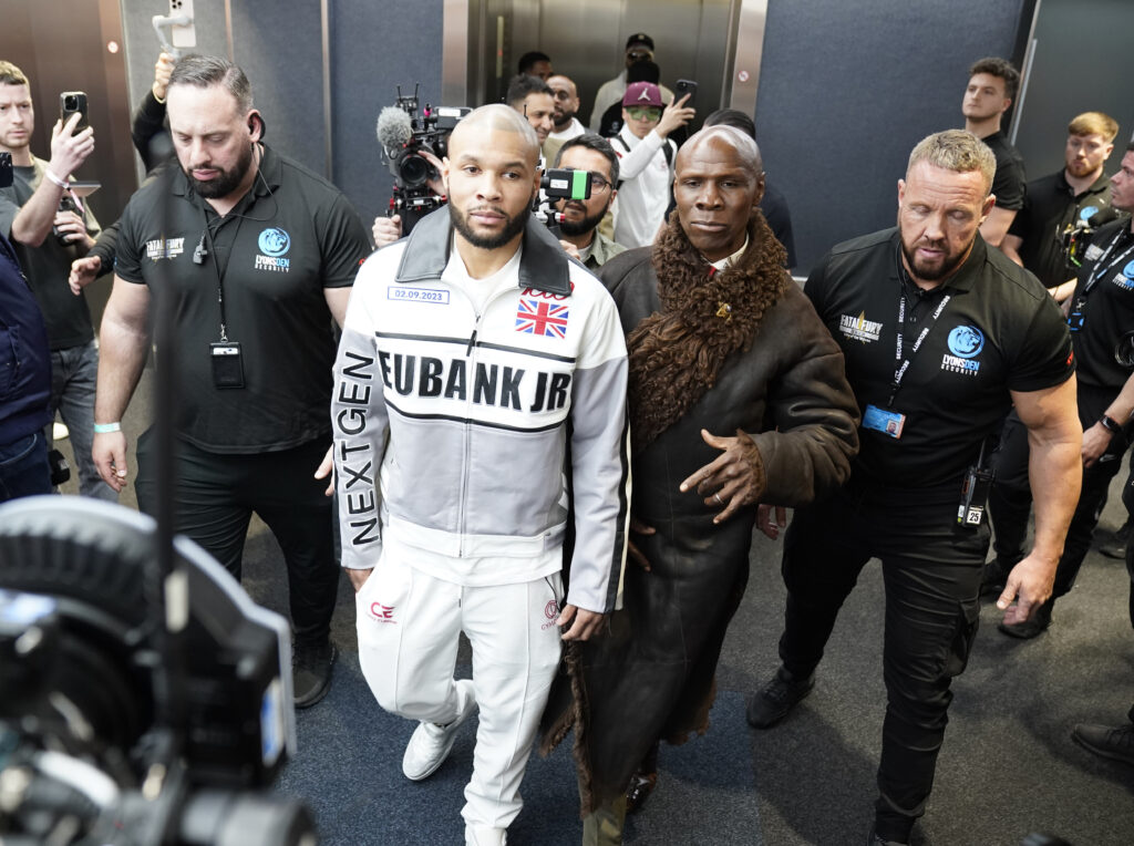 Chris Eubank jr. in white with his father Chris Eubank sr. ahead of his fight with Connor Benn at Tottenham Hotspur Stadium