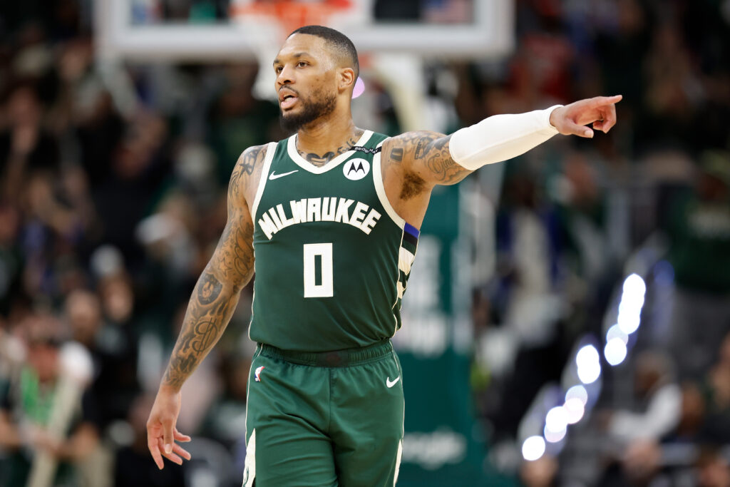 Damian Lillard #0 of the Milwaukee Bucks walks down court against the Indiana Pacers during game three