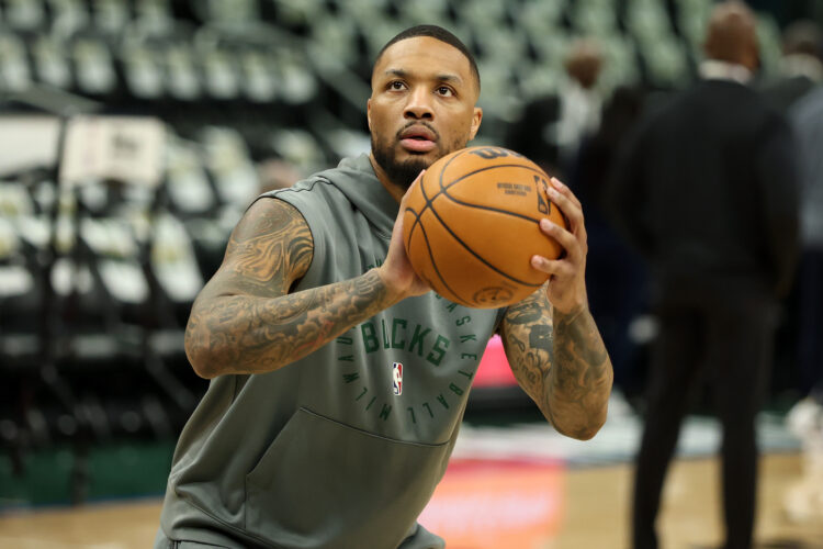 Damian Lillard #0 of the Milwaukee Bucks warms up before Game Four of the Eastern Conference
