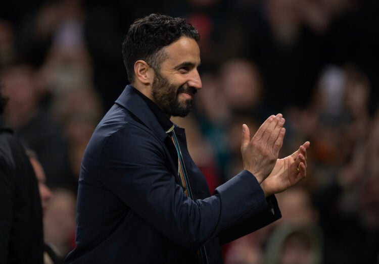 Ruben Amorim smiles and claps during Manchester United's Europa League tie with Athletic Club.