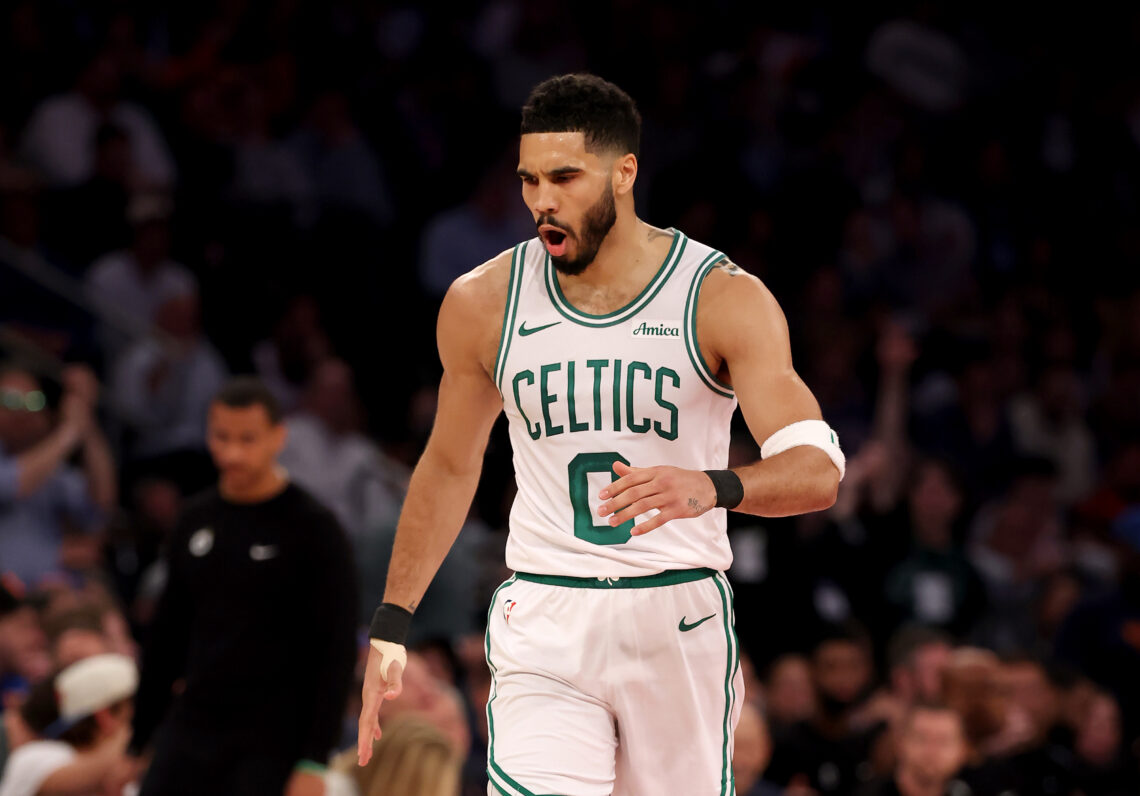 Jayson Tatum #0 of the Boston Celtics celebrates a three point shot