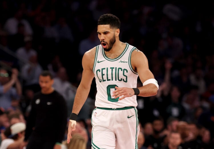 Jayson Tatum #0 of the Boston Celtics celebrates a three point shot