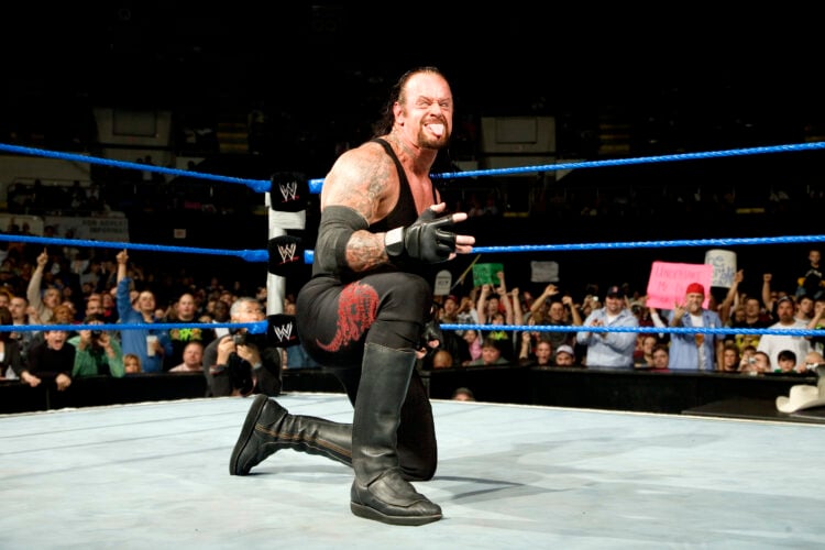 The Undertaker striking his iconic pose on WWE SmackDown in 2007