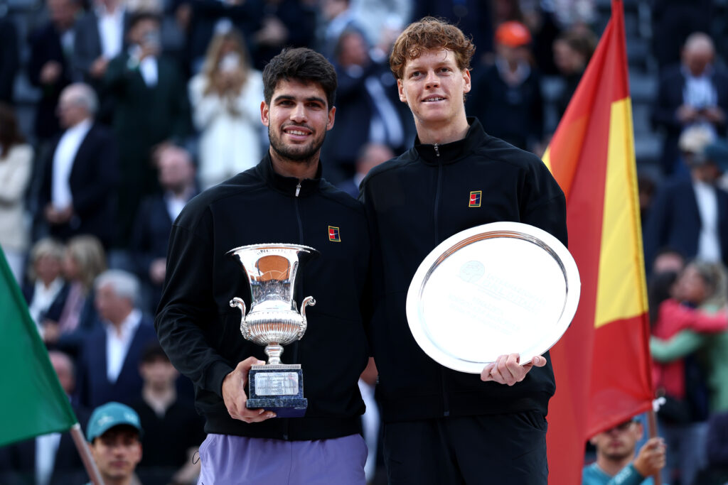 Jannik Sinner and Carlos Alcaraz with their trophies at the Rome Open