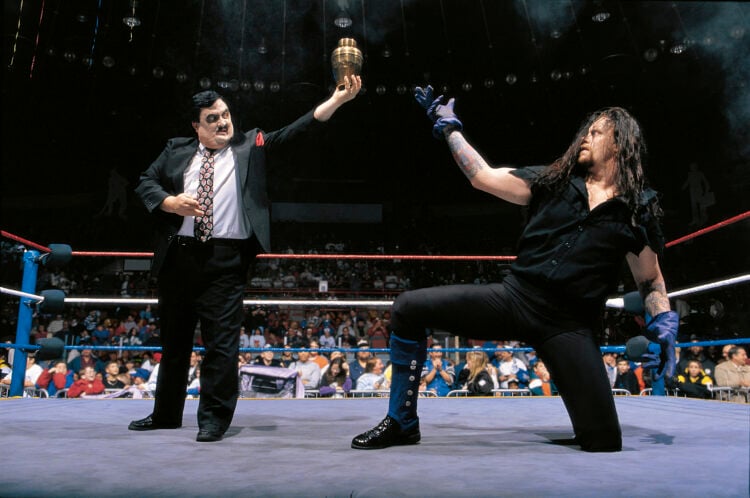 The Undertaker and Paul Bearer in a WWE ring