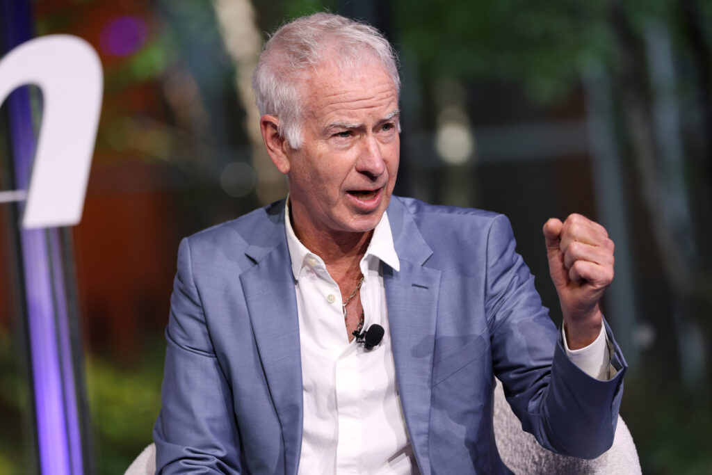 John McEnroe speaking at the US Open Reimagining Spectacular event in 2025