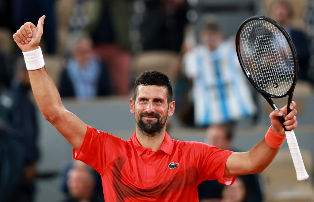 Novak Djokovic of Serbia celebrates winning match point