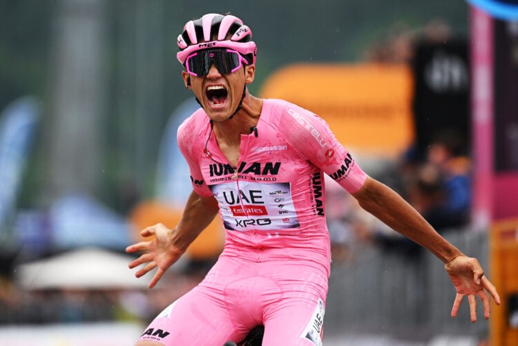 Isaac Del Toro of Mexico and Team UAE Team Emirates - XRG - Pink Leader Jersey celebrates