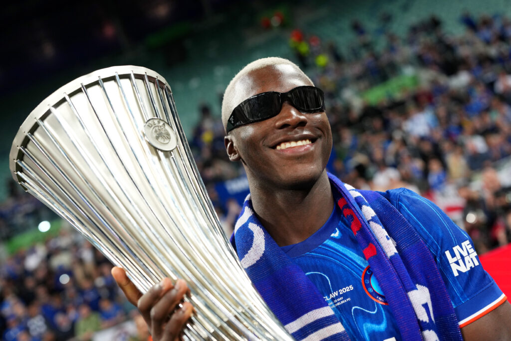 Moises Caicedo celebrates with the trophy after winning the UEFA Conference League with Chelsea against Real Betis.