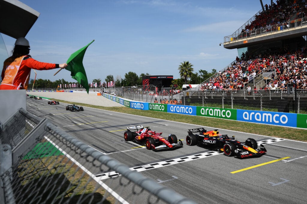 Ferrari's Charles Leclerc closes in on Red Bull's Max Verstappen during the 2025 Spanish Grand Prix.