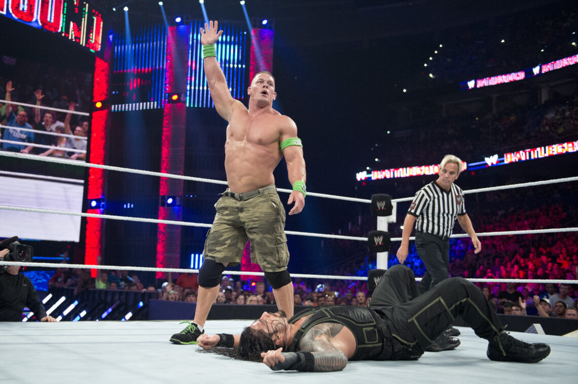 John Cena preparing the 'Five Knuckle Shuffle' against Roman Reigns at WWE Battleground in 2014