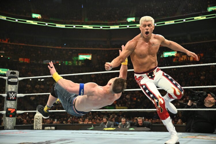 Cody Rhodes knocking John Cena down at WWE Money in the Bank