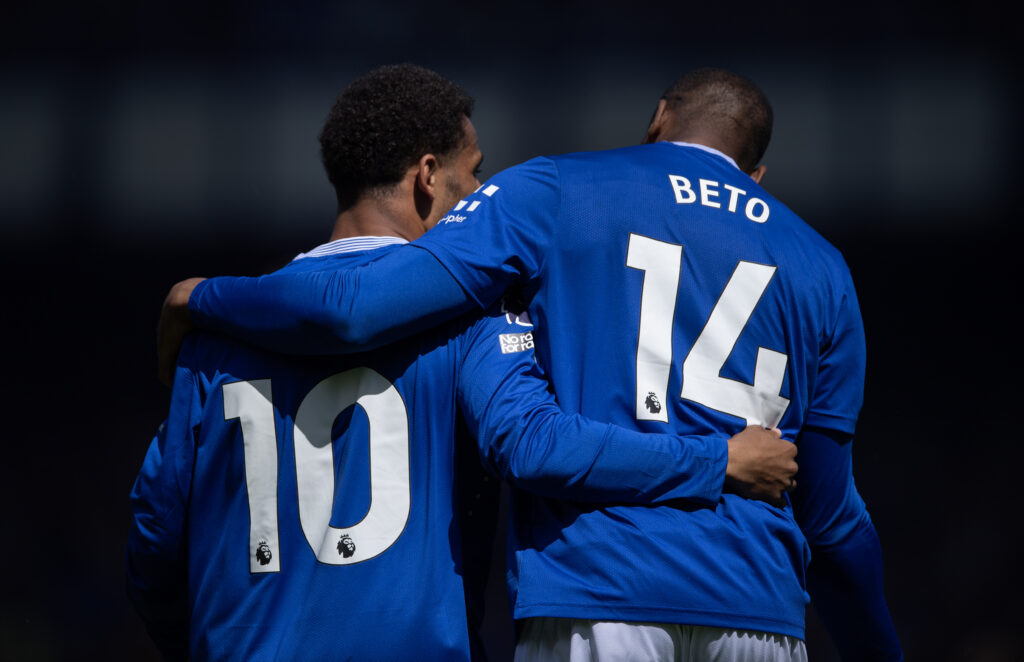 Beto embraces Illiman Ndiaye during an Everton match