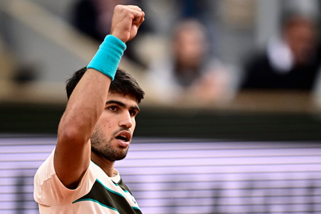 Carlos Alcaraz playing in the French Open final against Jannik Sinner