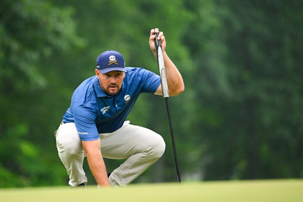 Bryson DeChambeau of Crushers GC putts at the eighth hole on day three of LIV Golf Virginia