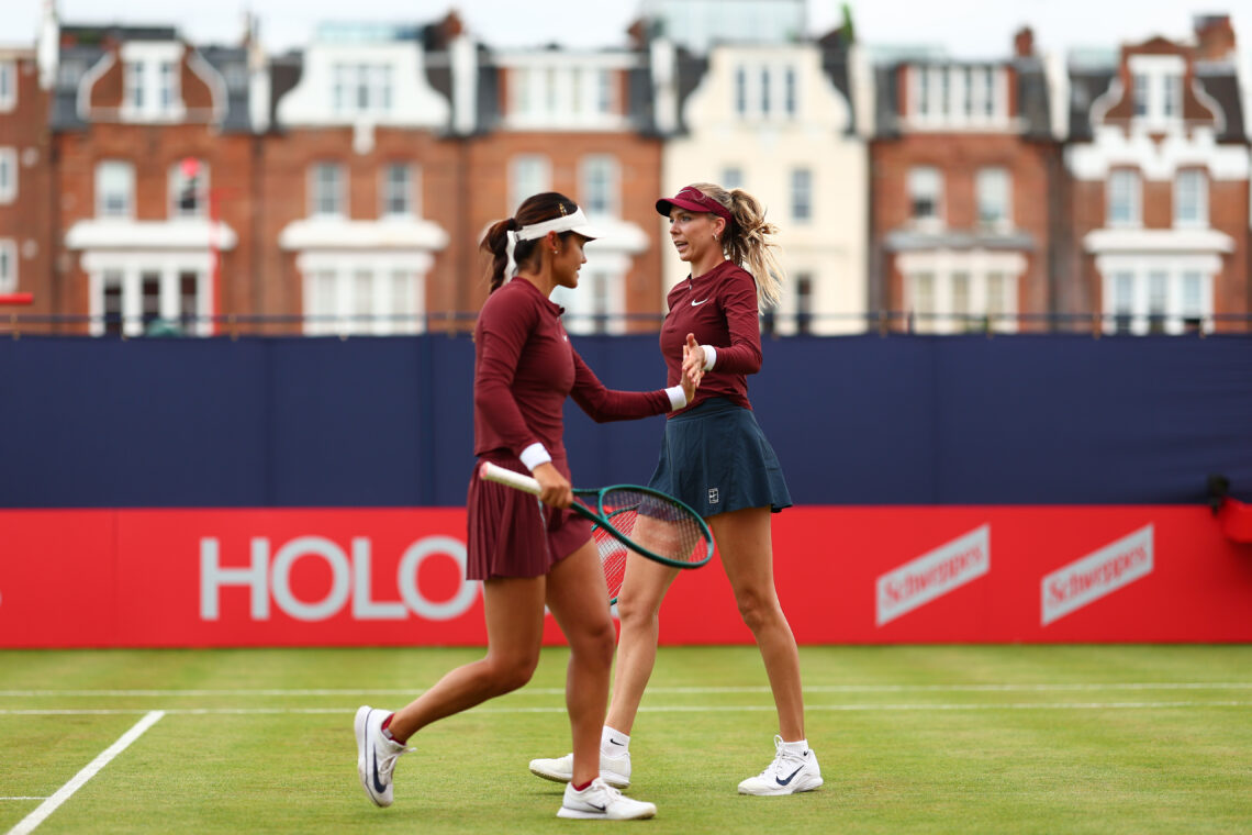 Katie Boulter (GBR) with Emma Raducanu (GBR) during their women's doubles Round 2 match