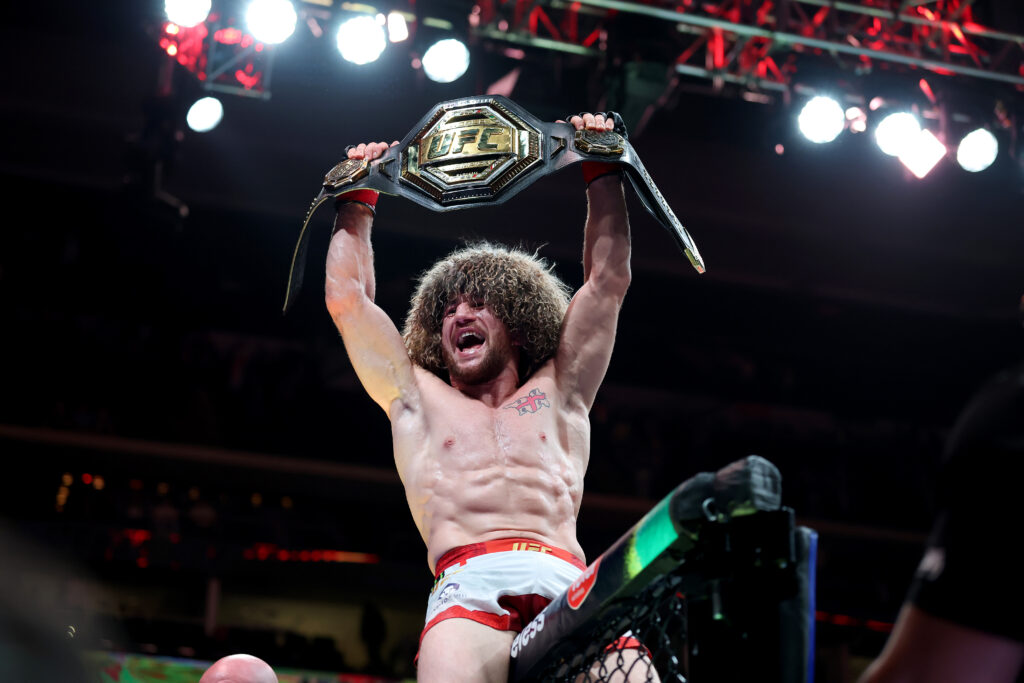 Merab Dvalishvili of Georgia celebrates after defeating Sean O'Malley of the United States in the bantamweight title