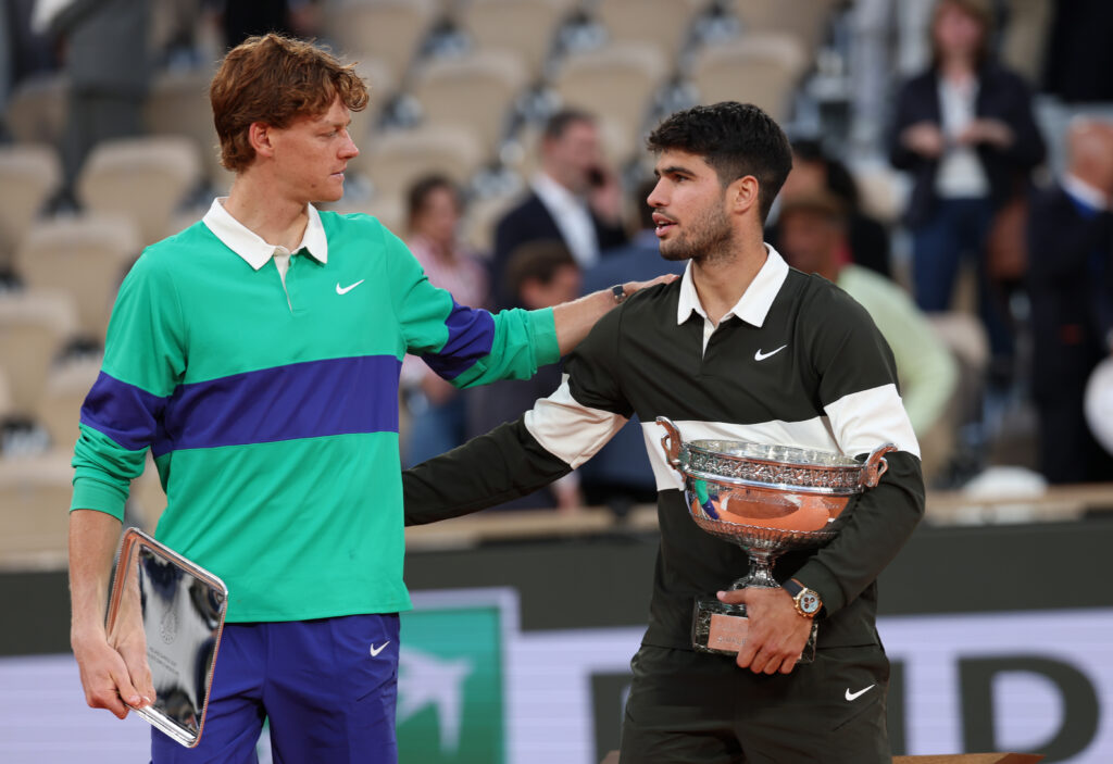 Carlos Alcaraz and Jannik Sinner embracing after the Roland Garros 2025 final