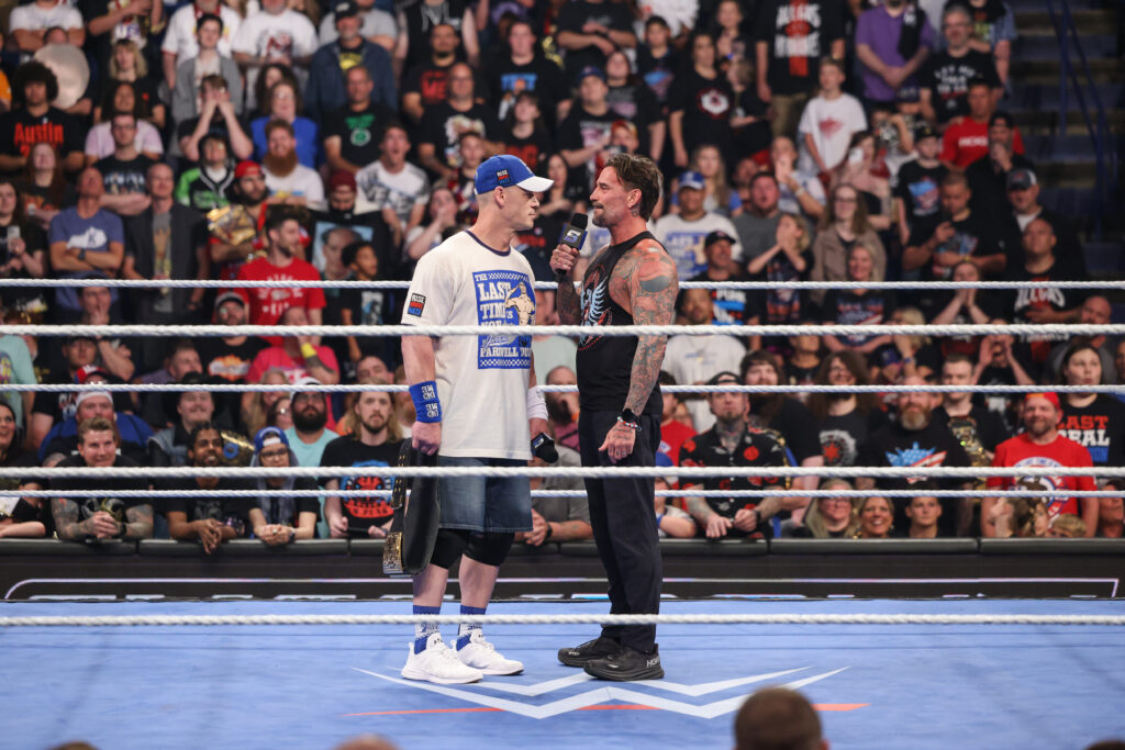 CM Punk and John Cena squaring off on WWE SmackDown