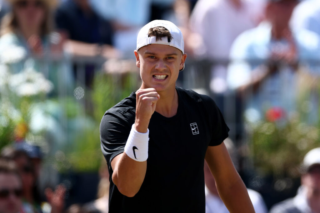 Holger Rune with his fist clenched at Queen's Club 2025