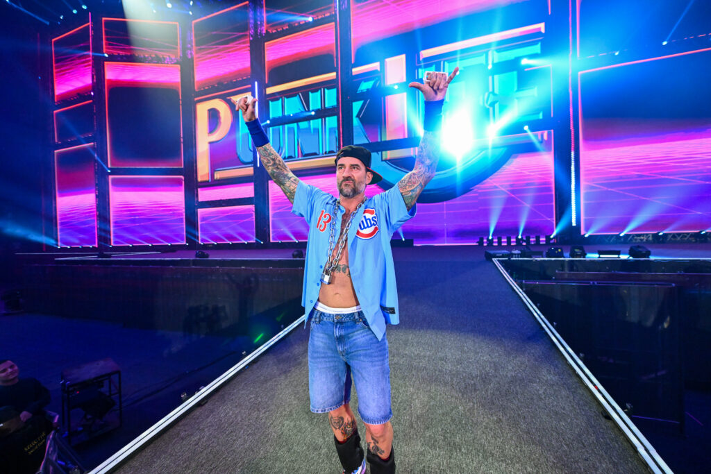 CM Punk teases John Cena with 'Punkanomics' entrance on SmackDown