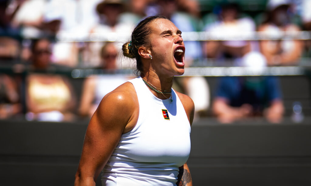 Aryna Sabalenka reacts during her match against Carson Branstine of Canada at Wimbledon 2025