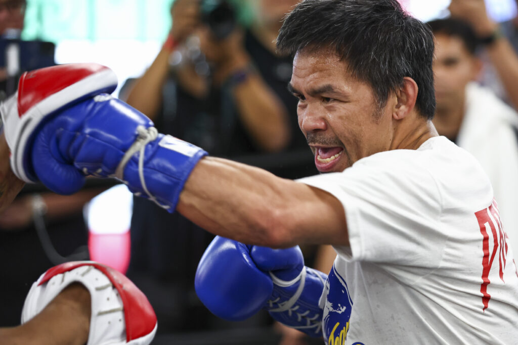Manny Pacquiao hits the pads at media workout