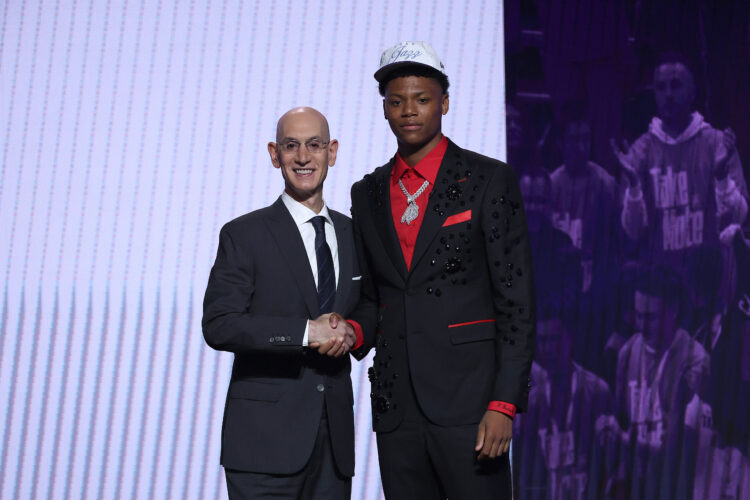 Ace Bailey shakes hands with NBA commissioner Adam Silver after being drafted fifth overall by the Utah Jazz during the first round of the 2025 NBA...