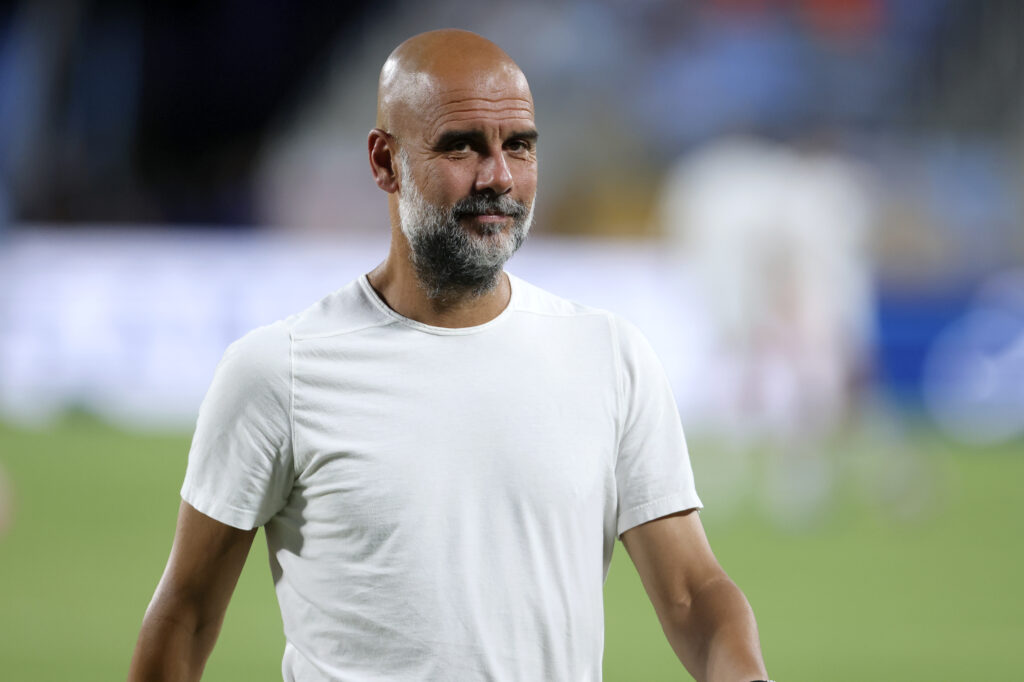 Pep Guardiola smiles during Manchester City FC v Al-Hilal
